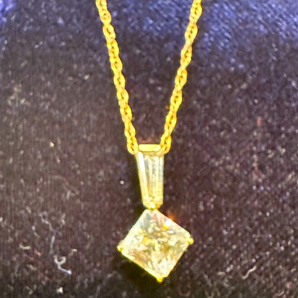 Cubic Zirconia charm set in 14k yellow gold on delicate 18” 14k chain